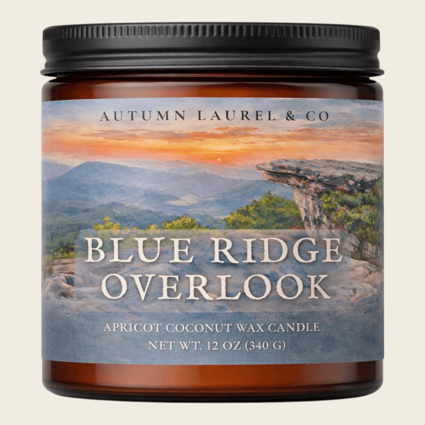 An amber glass jar candle with a black ribbed lid and a scenic label reading 'AUTUMN LAUREL & CO' and 'BLUE RIDGE OVERLOOK,' on a light beige background.