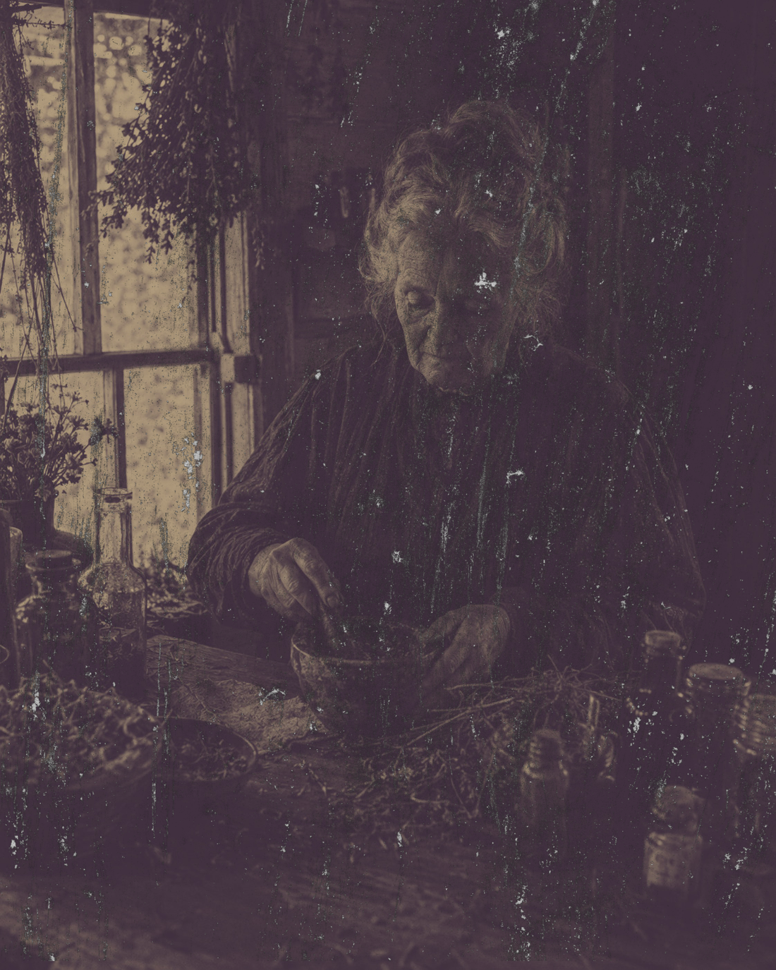 Antique-style sepia photograph of an elderly Appalachian folk healer seated at a wooden table inside a rustic mountain cabin, grinding herbs with a mortar and pestle. 
