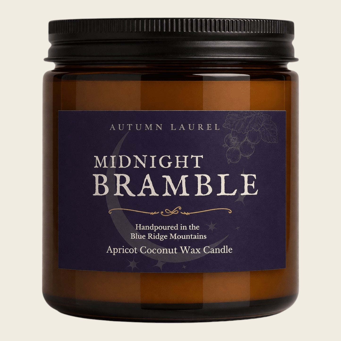An amber glass jar candle with a black ribbed lid and a dark purple label reading 'Autumn Laurel Midnight Bramble Apricot Coconut Wax Candle' on a light beige background.