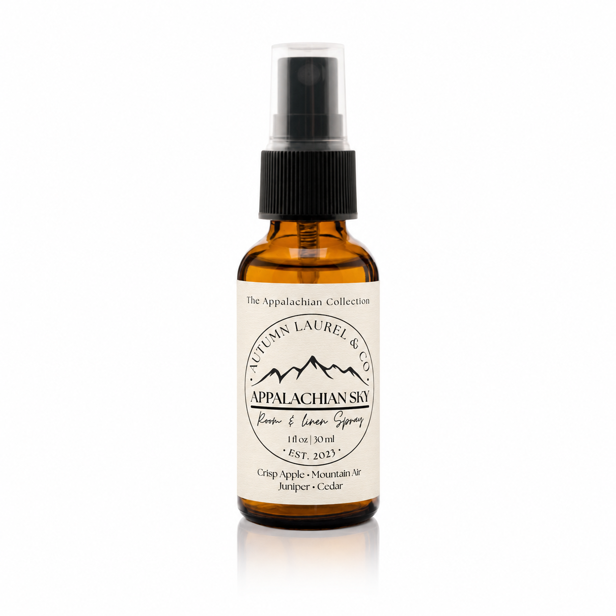 Appalachian Sky room and linen spray in a 1 ounce amber glass bottle with cream linen label