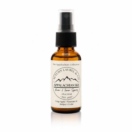 Appalachian Sky room and linen spray in a 1 ounce amber glass bottle with cream linen label