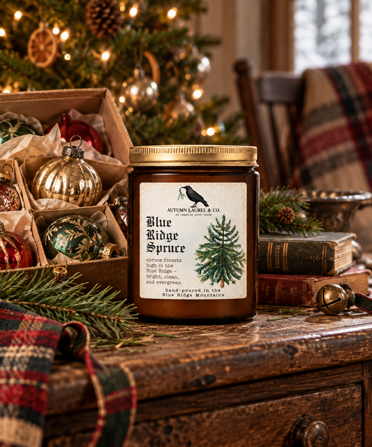 Blue Ridge Spruce amber jar candle by Autumn Laurel & Co. in a warm vintage Christmas setting