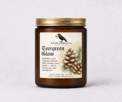Evergreen Glow amber jar candle with updated Old English Christmas label