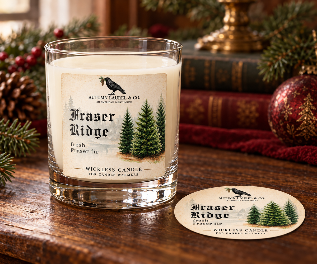 Fraser Ridge wickless candle in clear Libbey rocks glass with matching paper dust cover