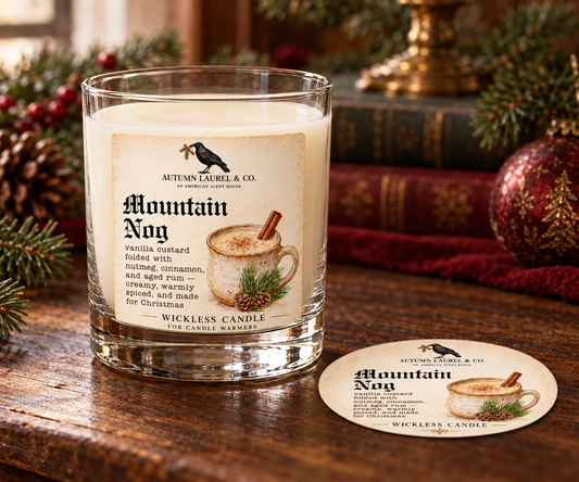 Mountain Nog wickless candle in clear Libbey rocks glass with matching paper dust cover