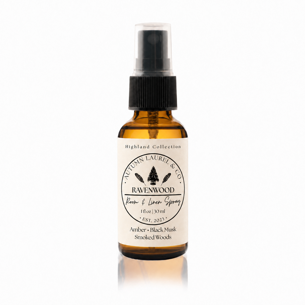 Ravenwood room and linen spray in a 1 ounce amber glass bottle with cream linen label