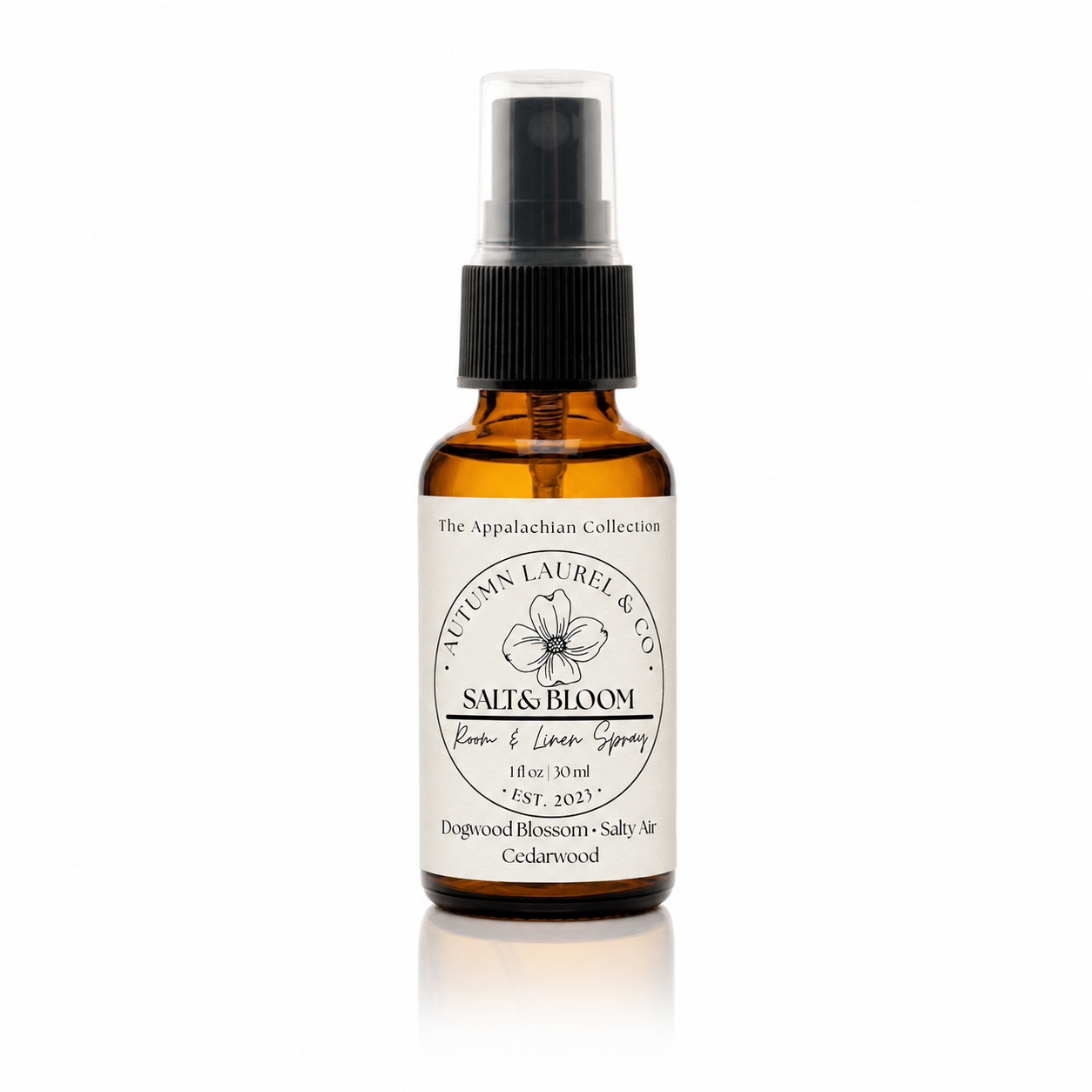 Salt & Bloom room and linen spray in a 1 ounce amber glass bottle with cream linen label