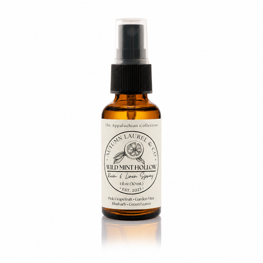 Wild Mint Hollow room and linen spray in a 1 ounce amber glass bottle with cream linen label